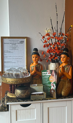 Thai decorative display with Buddha figures